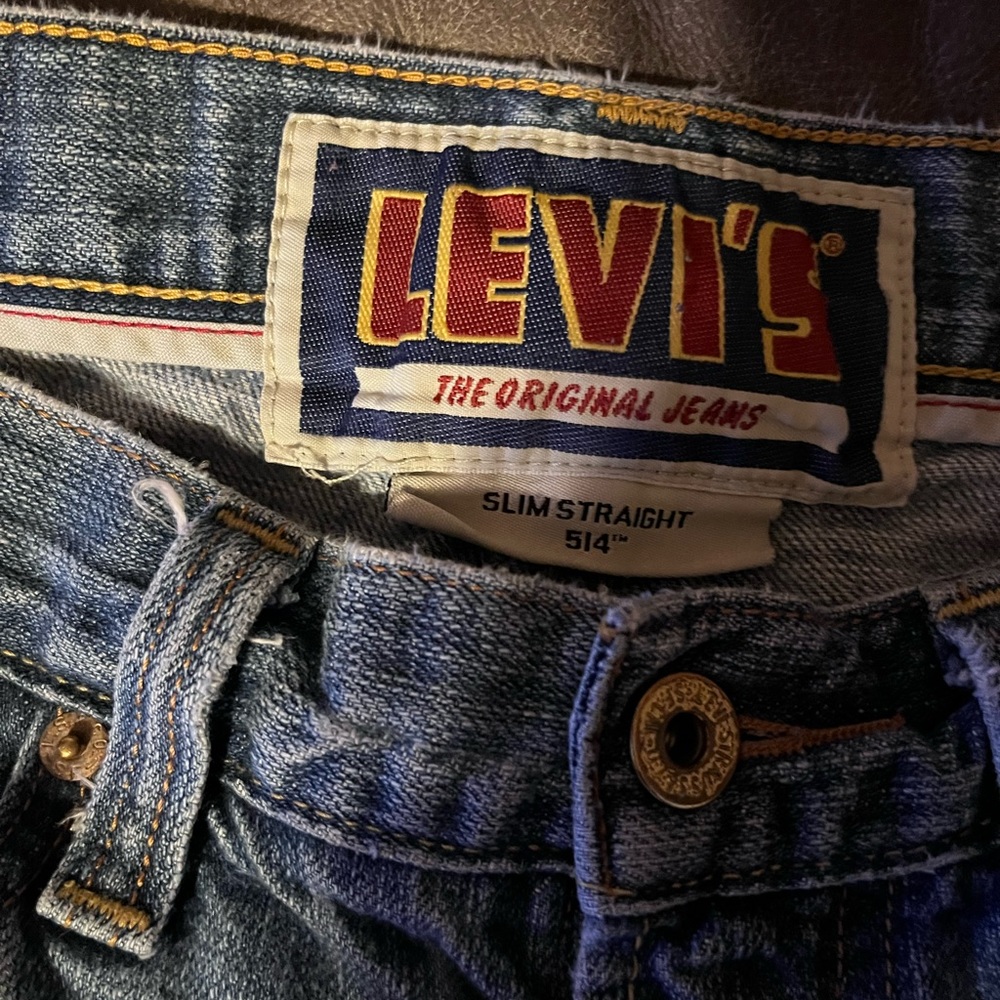 Used Levi’s Slim Straight 514 blue jeans, 32 waist by 30 length. Good condition